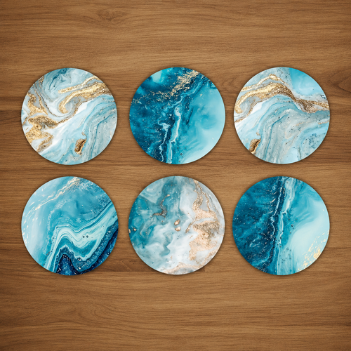 Set of six blue and gold marbled coasters on a wooden surface