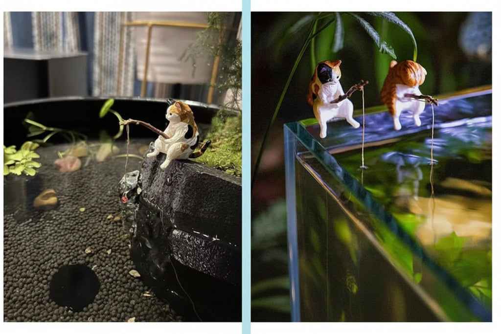 Cat-shaped fishing rod holder with a small fish attached, placed on a rock by a pond.