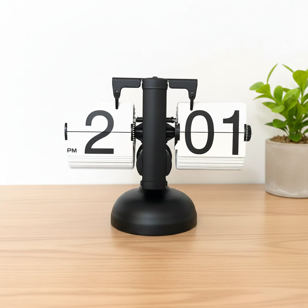 Flipping clock on a desk with a minimal background