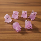 Set of pink pig figurines 
