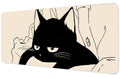 Mouse pad with black cat design on beige background