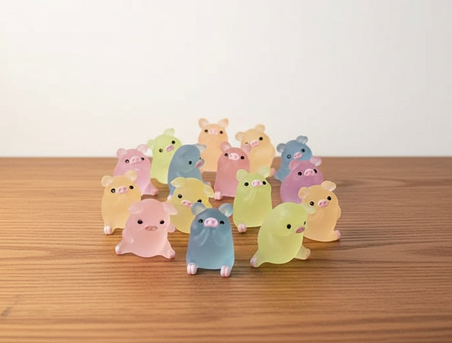 Colorful animal-shaped night lights arranged in a circular pattern on a wooden base.