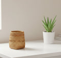 Woven basket on a wooden surface
