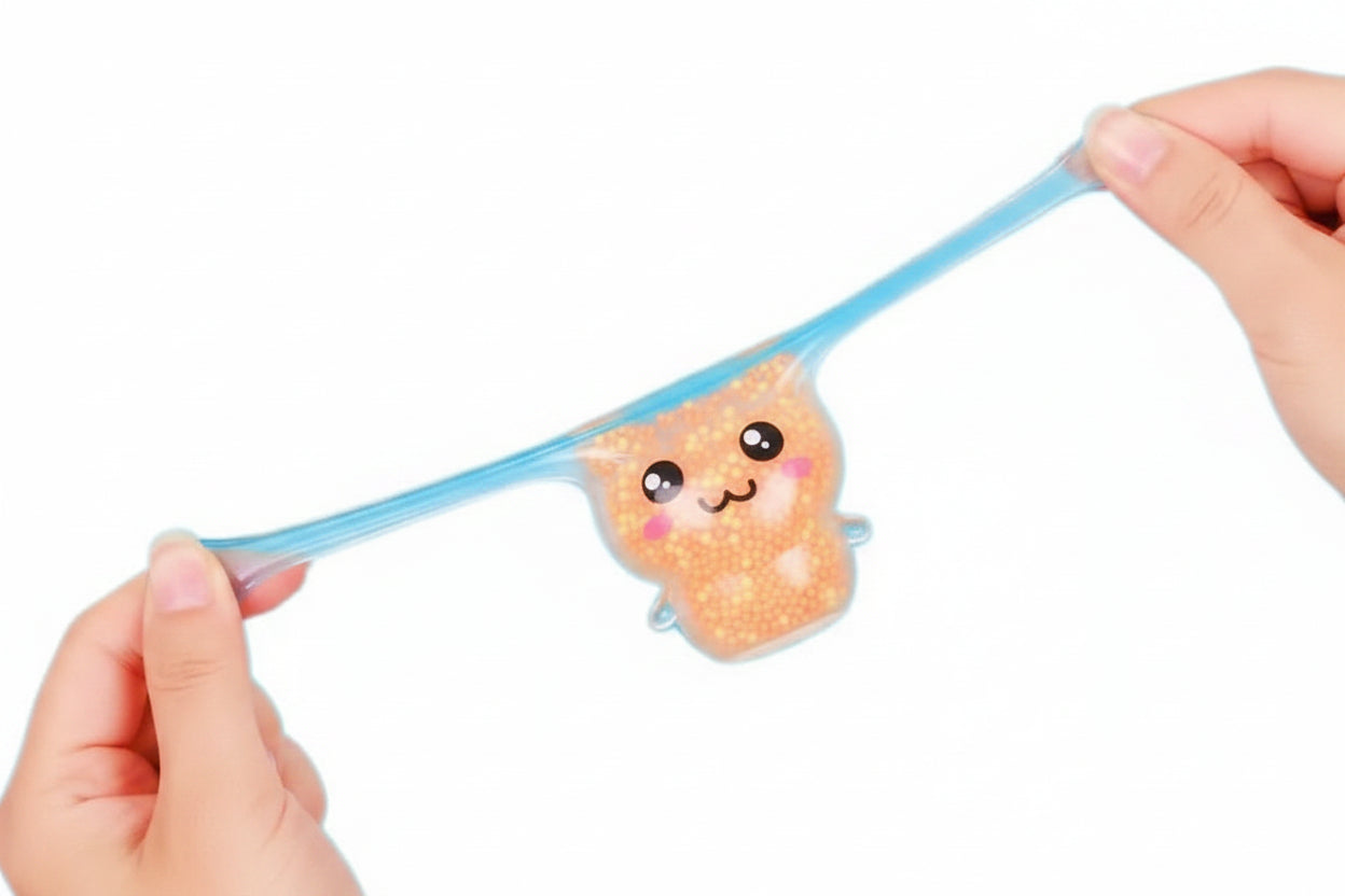cute rabbit-shaped squishy toywith colorful beads, ears being bulls by 2 hands