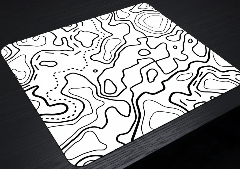 Digital art display with black and white abstract design on a screen