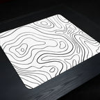 Topographic design on a mouse pad with a dark background