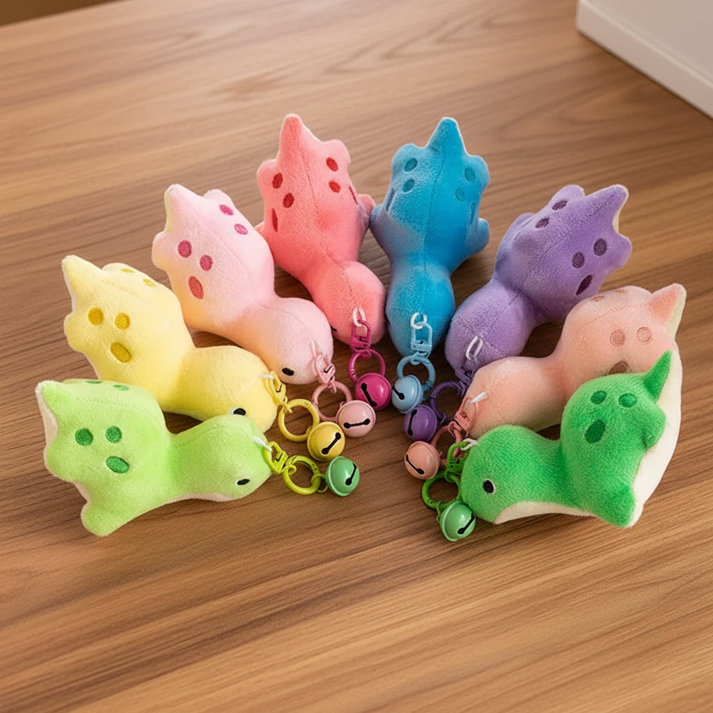 Colorful animal-shaped keychains on a light gray background