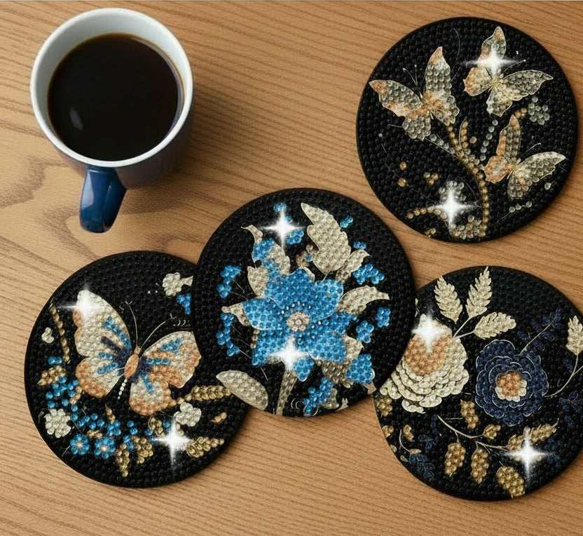 Decorative coasters with butterfly and floral designs on a wooden surface with a cup of coffee.