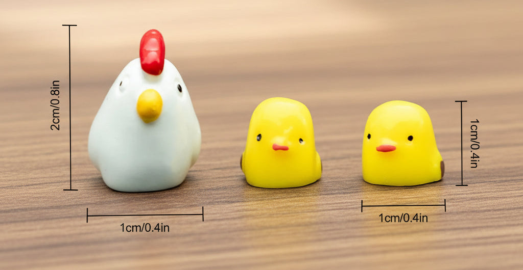 Three small rubber duck toys with measurements on a wooden surface