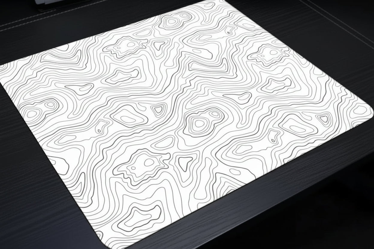 Light pad with topographic pattern on a dark surface