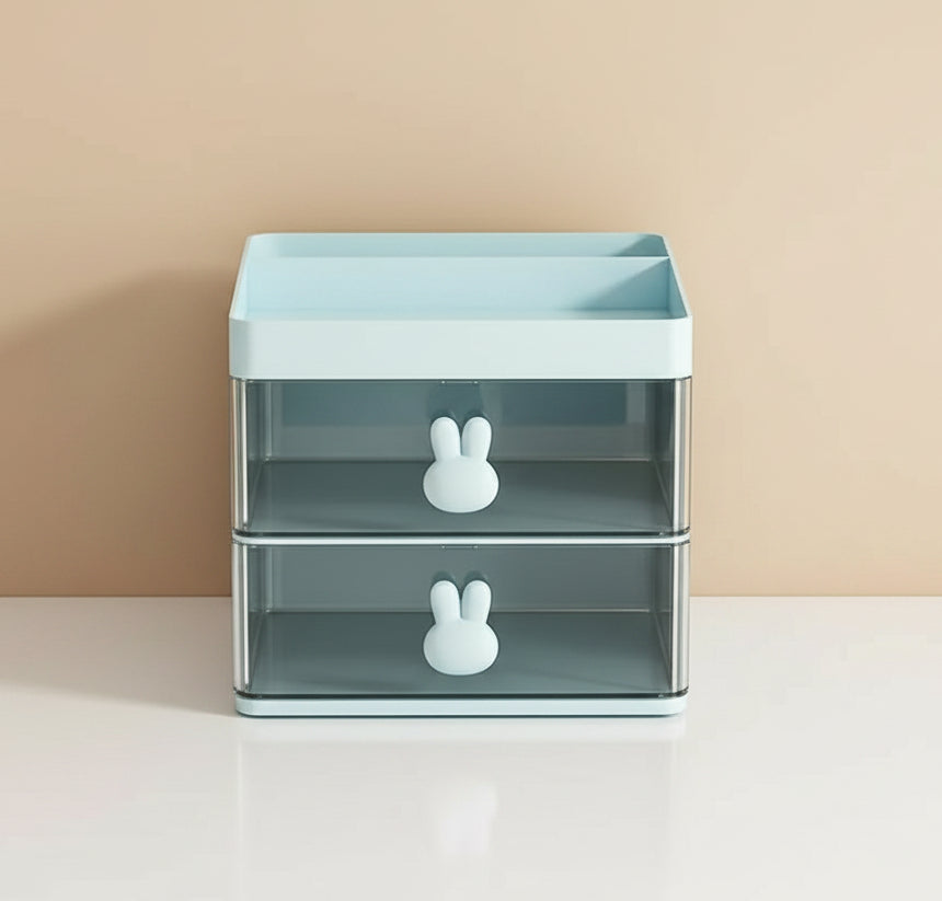Desk organizer with stationery items on a wooden desk