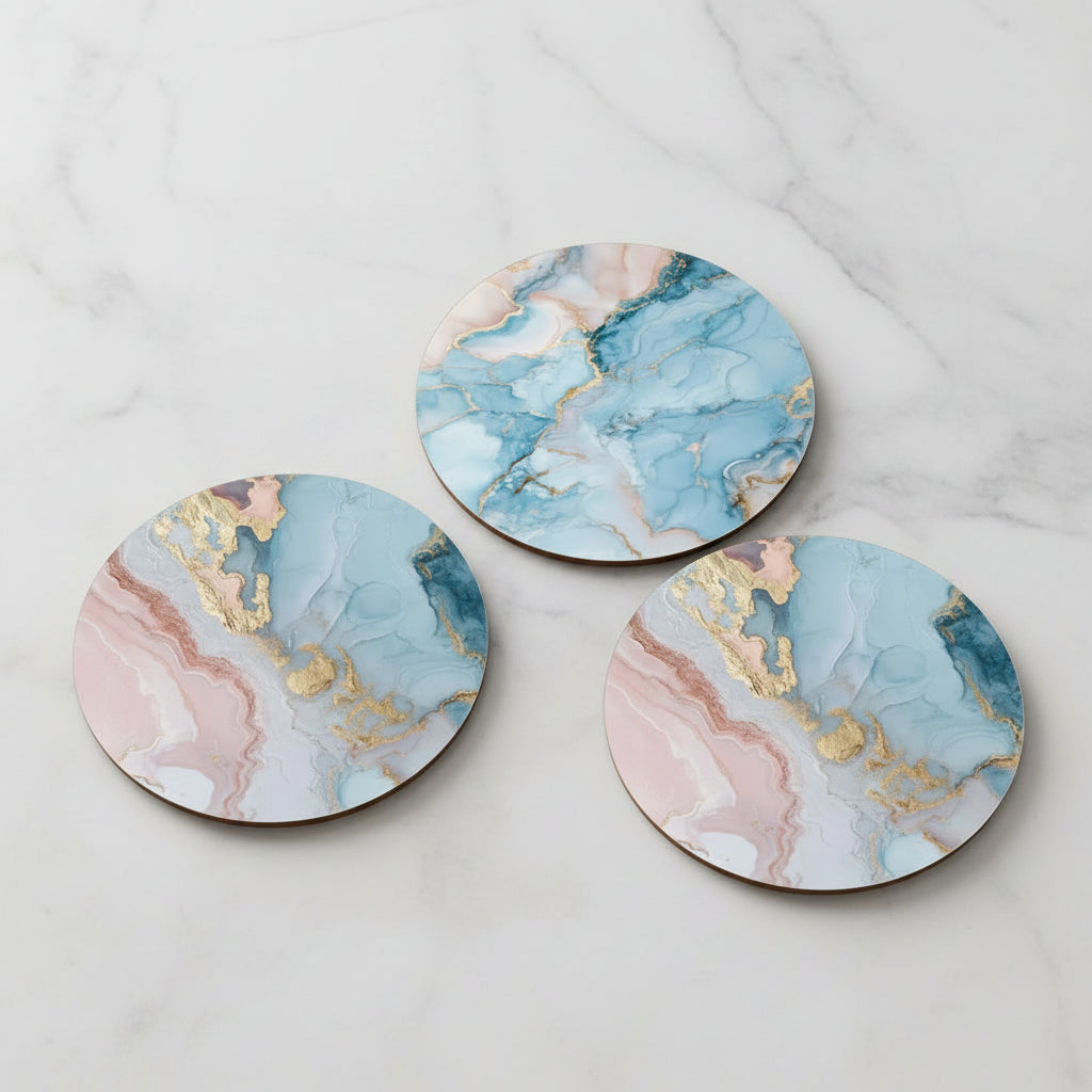 Colorful marble-patterned coasters on a table with a cup of tea.