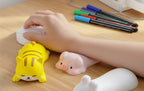 Person using a mouse weith a pig wrist rest