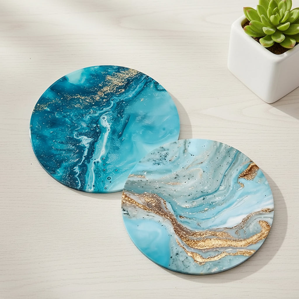 Two round marble-patterned coasters with gold accents on a light blue background with a white flower.